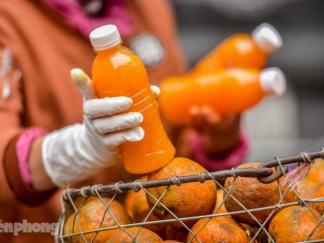 ”Hốt bạc” nhờ vắt nước cam trên phố Hà Nội thời dịch Covid-19