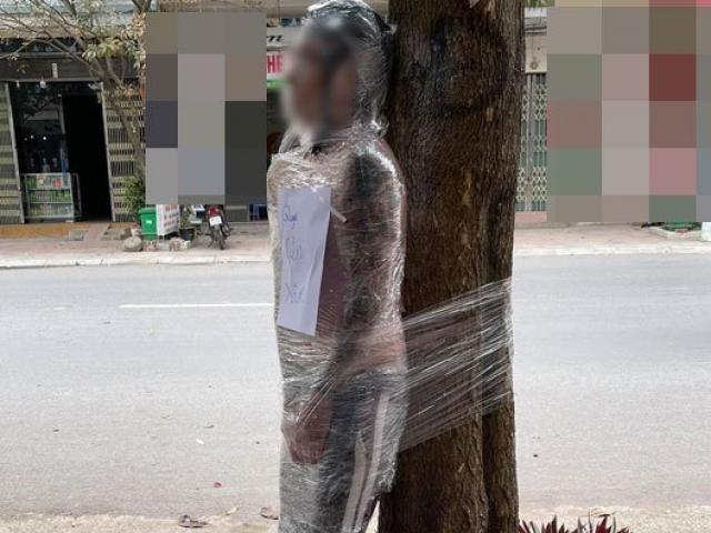 Thanh niên Hà Nội quỵt tiền xăm bị quấn băng keo kín người lên báo nước ngoài