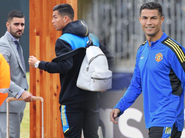 Ronaldo có vệ sĩ hộ tống như VIP, ”nịnh” fan MU trước trận ra quân Cúp C1