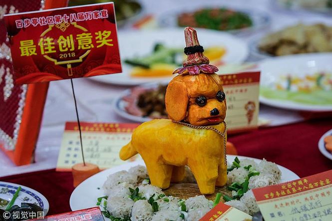 4 vạn gia đình tụ tập tất niên với 13.200 món ăn trang trí hình chó - 5