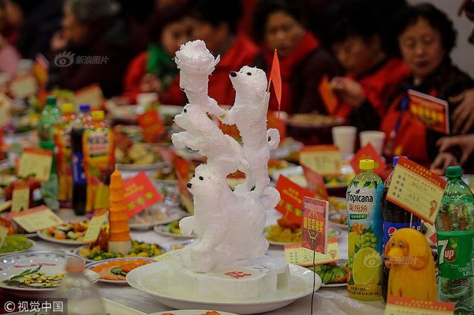 4 vạn gia đình tụ tập tất niên với 13.200 món ăn trang trí hình chó - 7