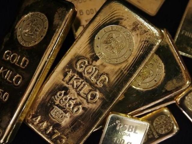 Tài chính - Bất động sản - Giá vàng hôm nay 9/1: Chịu áp lực, vàng vẫn bám trụ trên đỉnh