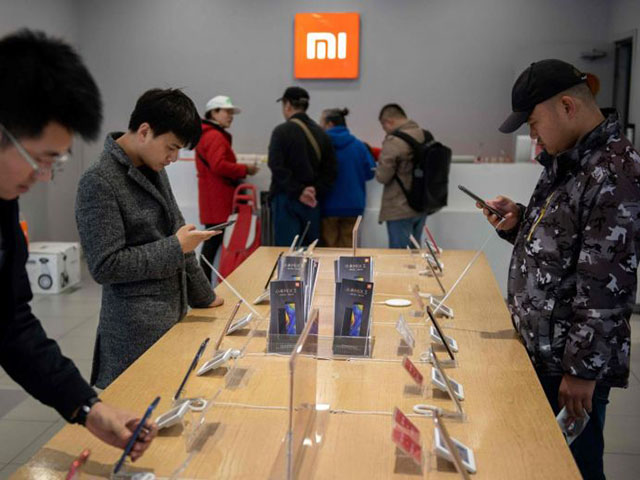 Thời trang Hi-tech - Đã sao chép thiết kế, Xiaomi còn ‘ăn theo’ chứng khoán Apple