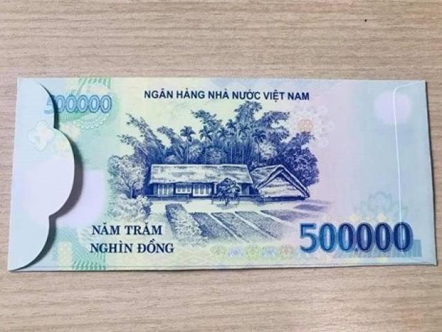 Kinh doanh - Bất chấp lệnh cấm, &quot;hàng độc&quot; bao lì xì in hình tiền Việt Nam vẫn rao bán trên mạng dịp gần Tết