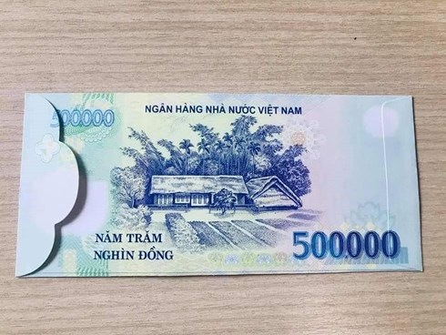 Bất chấp lệnh cấm, &#34;hàng độc&#34; bao lì xì in hình tiền Việt Nam vẫn rao bán trên mạng dịp gần Tết - 1