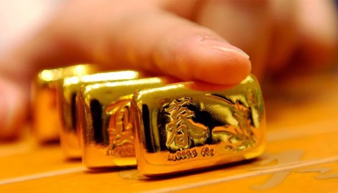 Giá vàng hôm nay 25/1: Vàng bị tranh mua, giá tăng sốc - 1