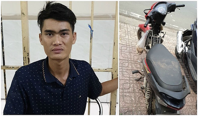 1 phụ nữ giật lại chiếc bóp trên tay kẻ cướp giật ở quận 1 - 1