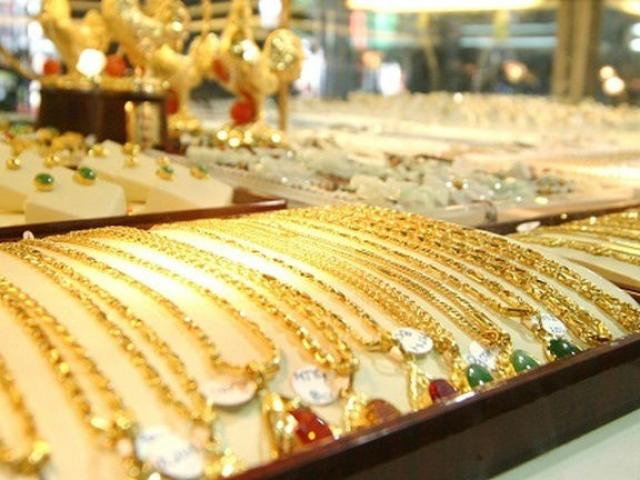 Kinh doanh - Giá vàng hôm nay 9.2: Thỏa thuận thương mại Mỹ Trung bấp bênh, USD đạt đỉnh 2 tuần, vàng mất giá.