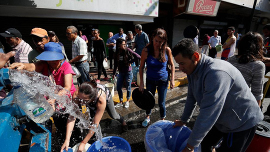 Vừa khôi phục gần hết lưới điện, Venezuela điều tra thủ lĩnh đối lập - 1