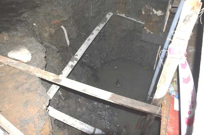 Phát hiện xương người trong một hố sâu - 3
