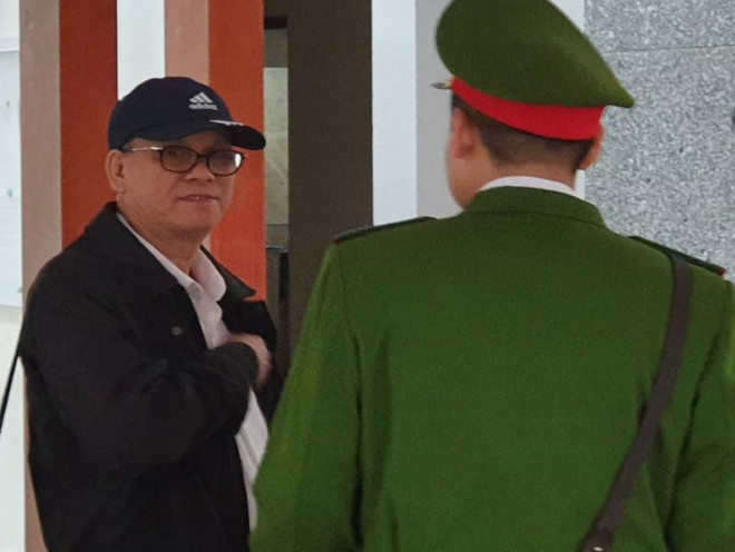 Cựu chủ tịch UBND TP Đà Nẵng Trần Văn Minh tại tòa. Ảnh: TP