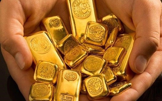 Giá vàng lao đầu giảm sau khi lên đỉnh 7 năm