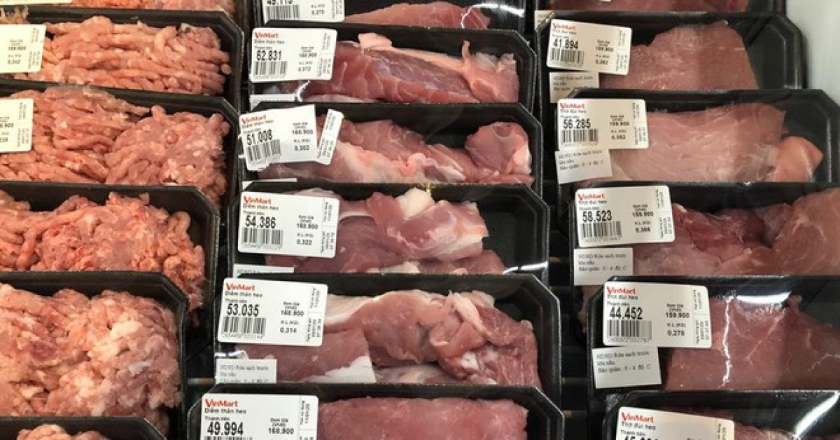 Siêu thị giữ giá thịt lợn cao chót vót mặc kệ lợn hơi, thịt chợ tụt dốc - 1