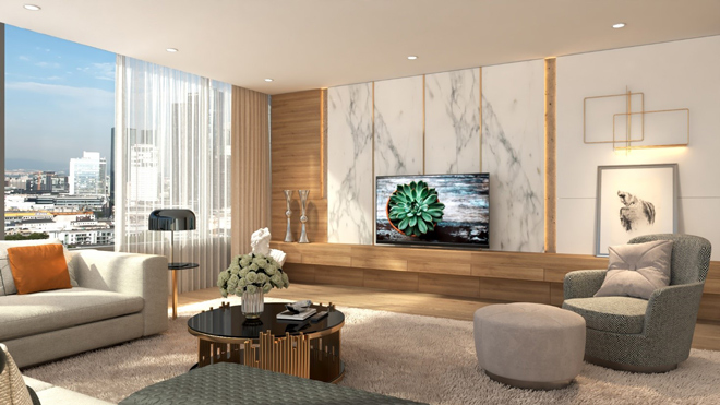 Thiết kế giấu chân của OLED TV LG E9 khớp với hệ kệ tủ treo không chân và được kéo lơ lửng trên những đường nẹp chỉ vàng của mảng đá tường