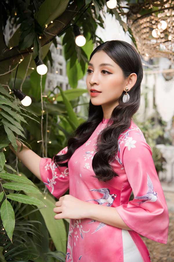 Top 10 Hoa hậu Việt Nam khoe nét duyên dáng trong áo dài cách tân - 6