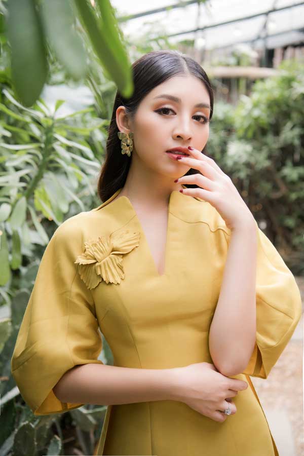 Top 10 Hoa hậu Việt Nam khoe nét duyên dáng trong áo dài cách tân - 13