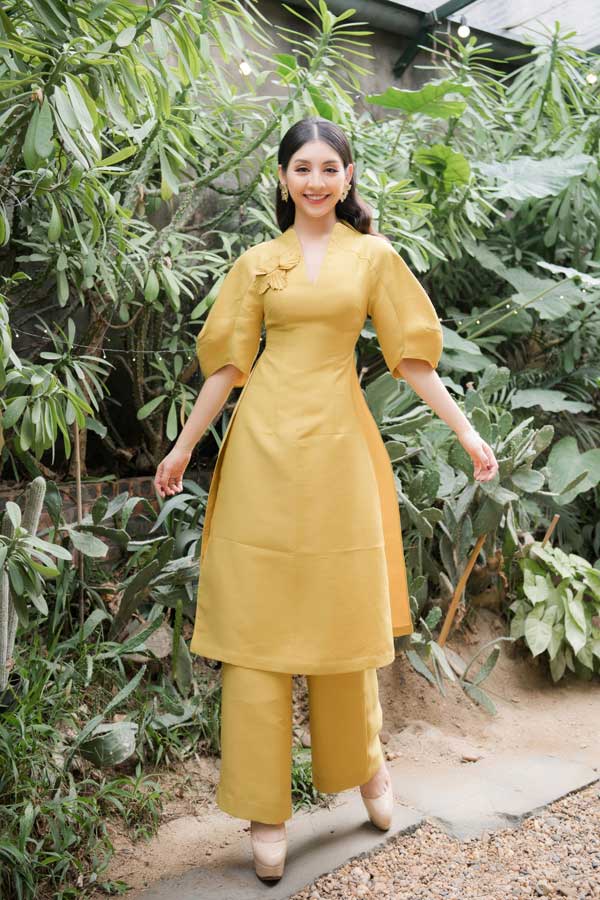 Top 10 Hoa hậu Việt Nam khoe nét duyên dáng trong áo dài cách tân - 11
