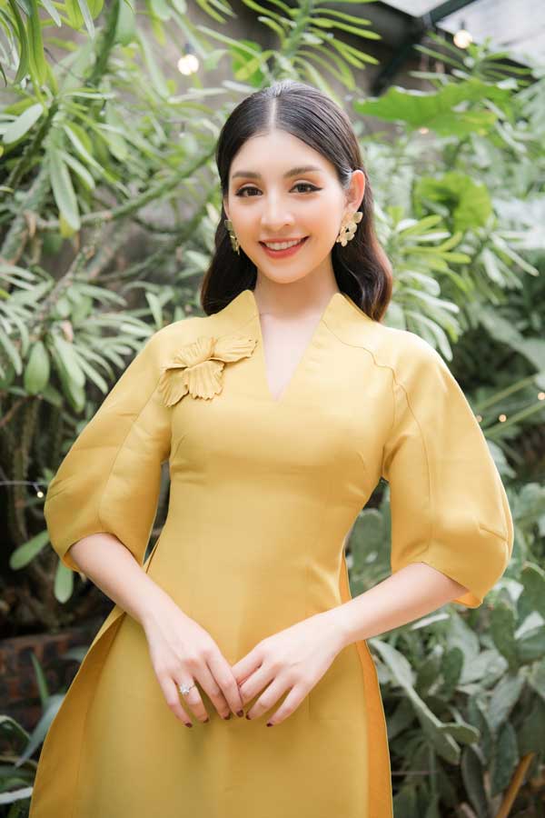 Top 10 Hoa hậu Việt Nam khoe nét duyên dáng trong áo dài cách tân - 12
