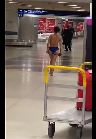Người phụ nữ thản nhiên cởi đồ, đi lại ở sân bay quốc tế miami