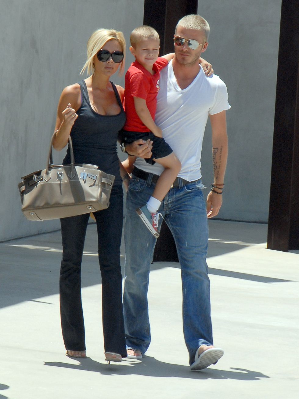 Vợ chồng Beckham chiếm trọn spotlight nhờ gu thời trang đồng điệu - 8