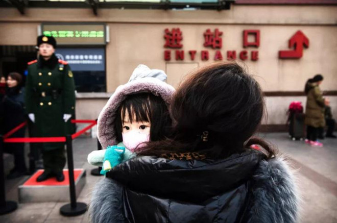 Tại Bắc Kinh, Trung Quốc, người dân được khuyến cáo đeo khẩu trang để phòng ngừa virus nCoV
