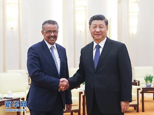 Tổng giám đốc WHO Tedros Adhanom Ghebreyesus bắt tay Chủ tịch Tập Cận Bình trong cuộc gặp tại Bắc Kinh hôm 28-1. Ảnh: News.cn