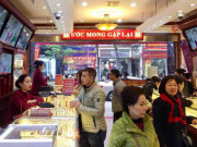 Kinh doanh - Có tiền đầu tư vàng hay bất động sản?