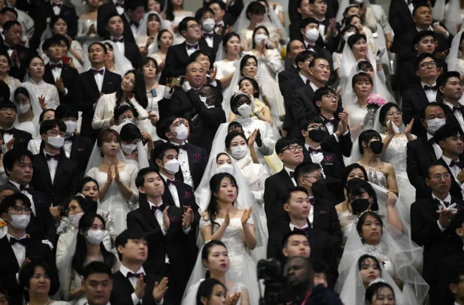 Những hình ảnh đáng kinh ngạc về đám cưới tập thể của 6.000 cặp đôi giữa thời virus Corona - 7