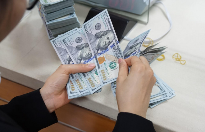 Giá USD ngân hàng đã tăng đáng kể so với cuối năm ngoái. Ảnh: Linh Anh
