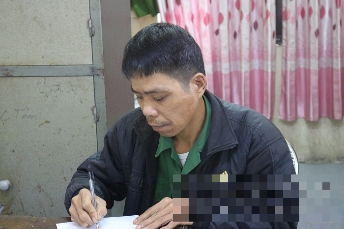 Triệu Văn Huynh tại trụ sở công an.