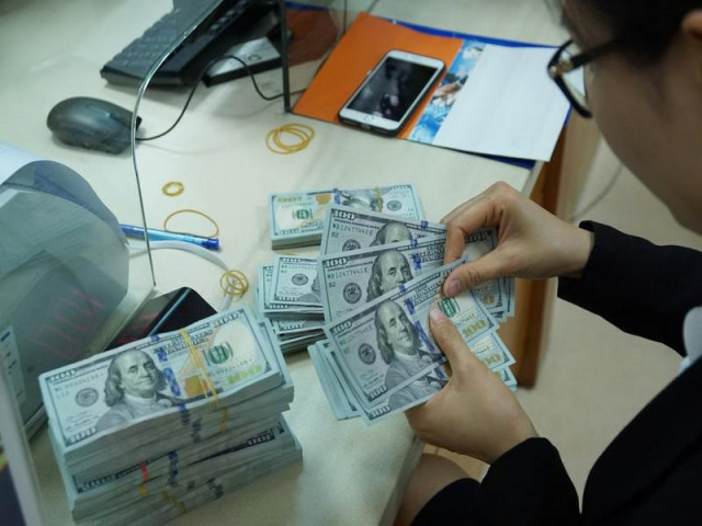 Kinh doanh - Ngân hàng Nhà nước lý giải việc giá USD đột ngột tăng mạnh