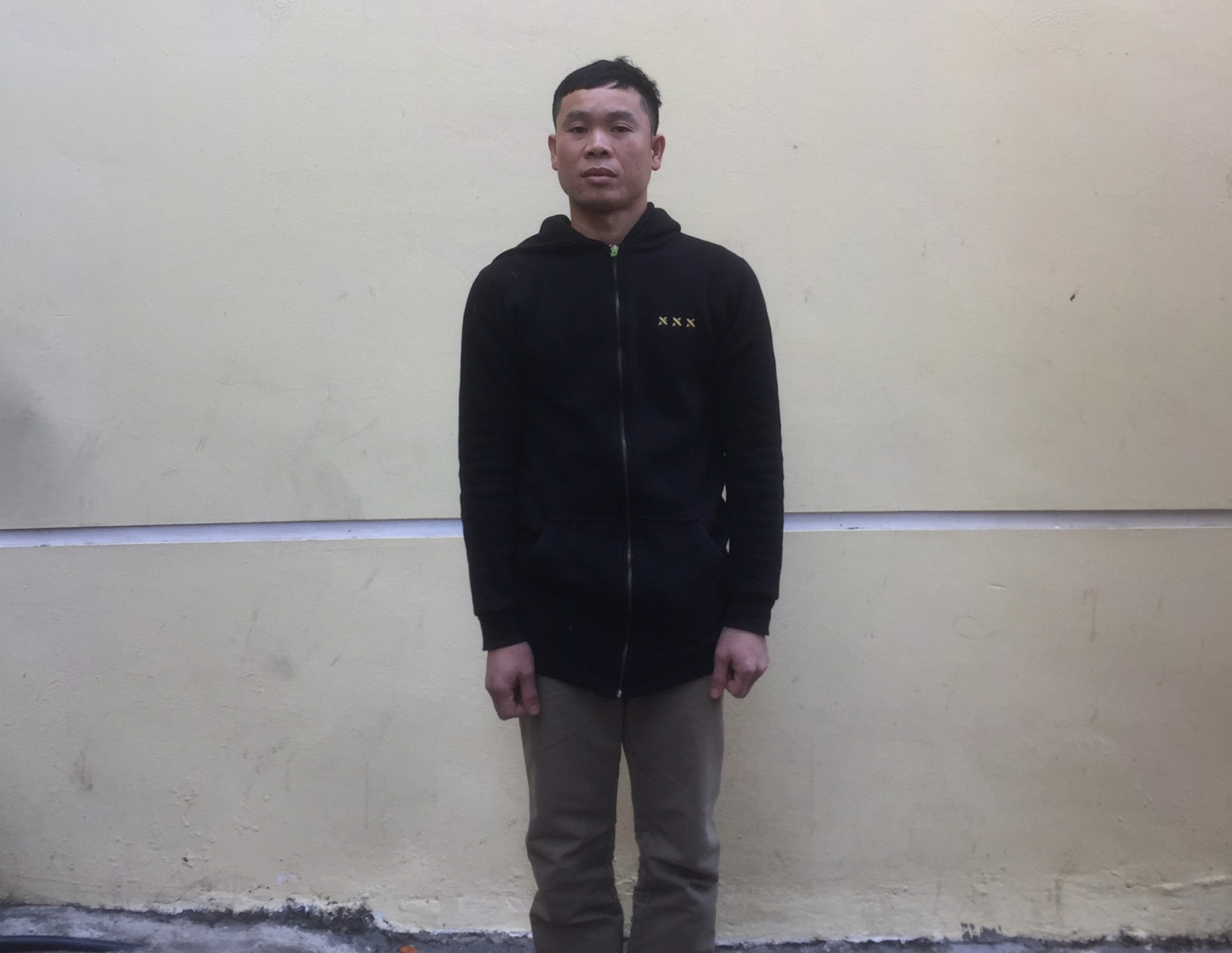 Vũ Văn Chót tại trụ sở công an.