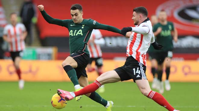 Tottenham (áo xanh) chơi đầy quyết tâm trước Sheffield