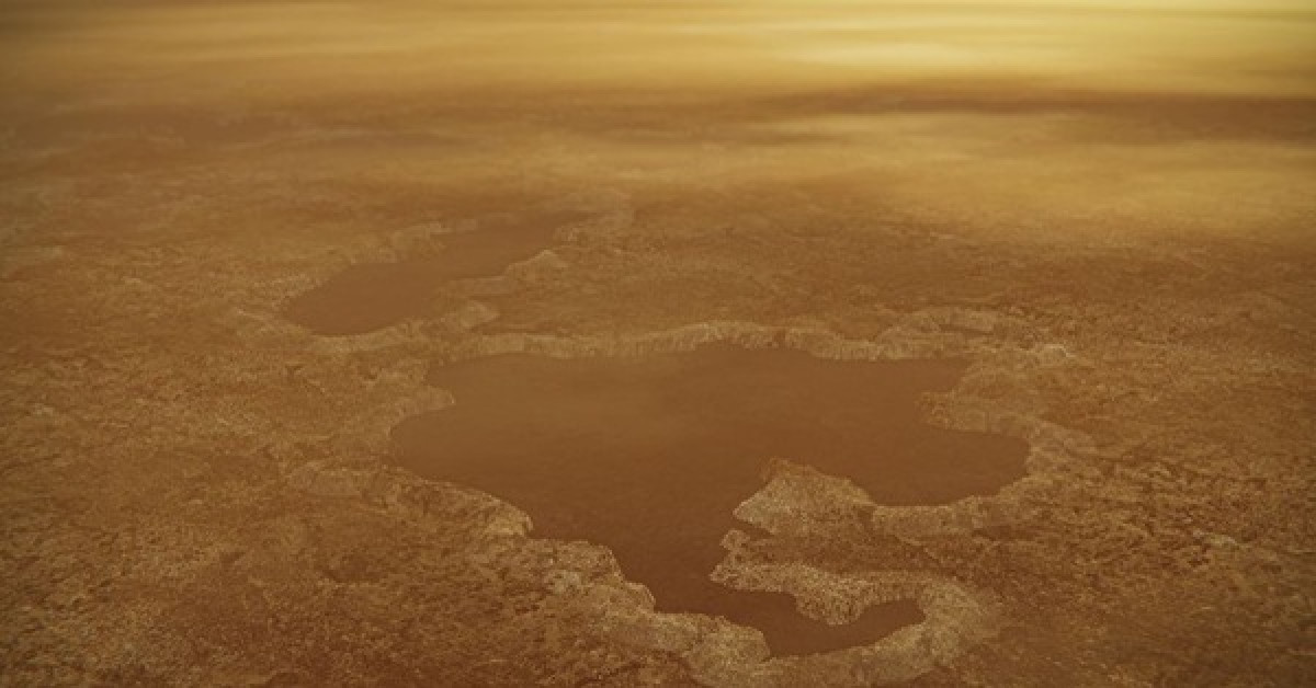 Bề mặt Titan giống với Trái Đất, có nhiều sông, suối, ao, hồ, trong khi bầu khí quyển đầy phân tử hữu cơ bí ẩn - Ảnh: NASA