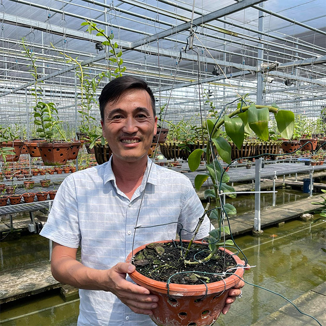 Chân dung anh Vinh tại vườn lan Thảo Ngân
