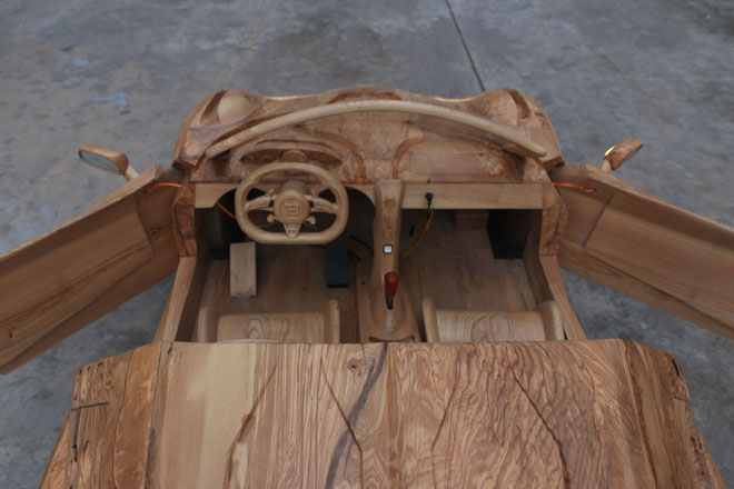 See the tiny wooden Bugatti "supercar", running the electric motor of a young father for his son - 11