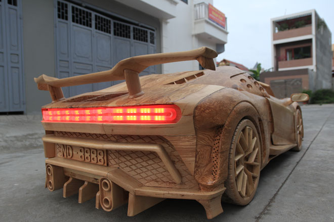See the tiny wooden Bugatti "supercar", running the electric motor of a young father for his son - 14