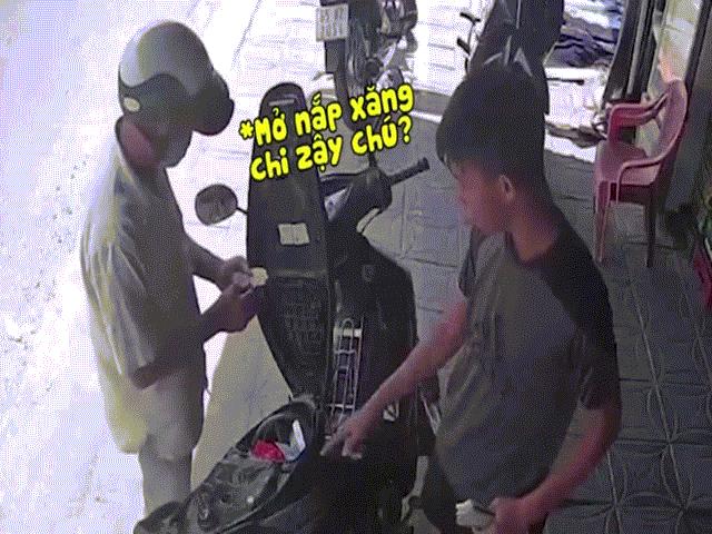 Bạn trẻ - Cuộc sống - Clip: Đỉnh cao "mất trí", người đàn ông đi mua thuốc lại mở nắp bình xăng