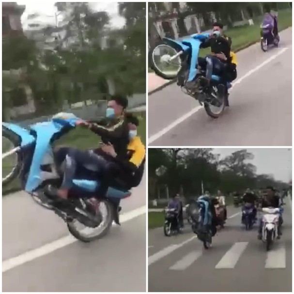 Nhóm thanh niên không đội mũ bảo hiểm bốc đầu xe máy trên cầu Cửa Hội. Ảnh cắt từ clip