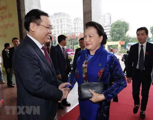 Ông Vương Đình Huệ, Ủy viên Bộ Chính trị, Bí thư Thành ủy Hà Nội, đón Chủ tịch Quốc hội Nguyễn Thị Kim Ngân đến dự khai mạc Đại hội đại biểu Đảng bộ TP Hà Nội tháng 10-2020. Ảnh: TTXVN