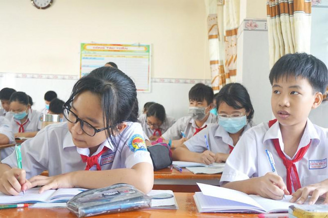 Học sinh lớp 6 Trường THCS Thông Tây Hội, quận Gò Vấp, TP.HCM trong một tiết học. Ảnh: NGUYỄN QUYÊN