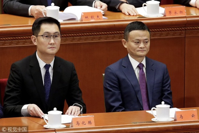 Tỷ phú Mã Hóa Đằng (trái) đã tụt xuống vị trí thứ 4 trong danh sách những người giàu nhất Trung Quốc, xếp ngay trên Jack Ma.