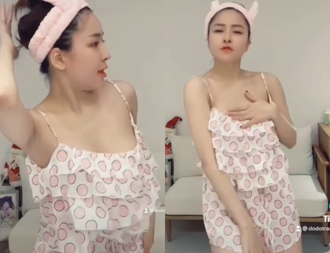Hot girl quê Thanh Hóa chật vật dùng tay che chắn vì mặc áo hai dây nhảy múa.
