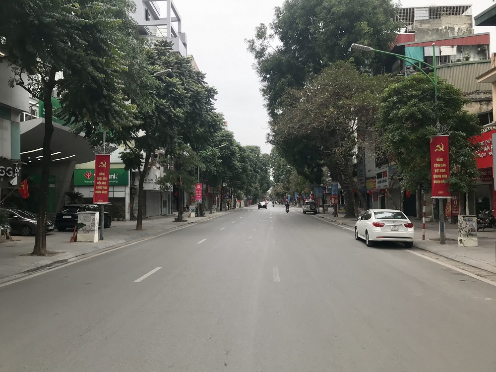 Vẻ tĩnh lặng, đẹp dịu dàng rất lạ của đường phố Hà Nội, TP.HCM sáng đầu năm mới - 7