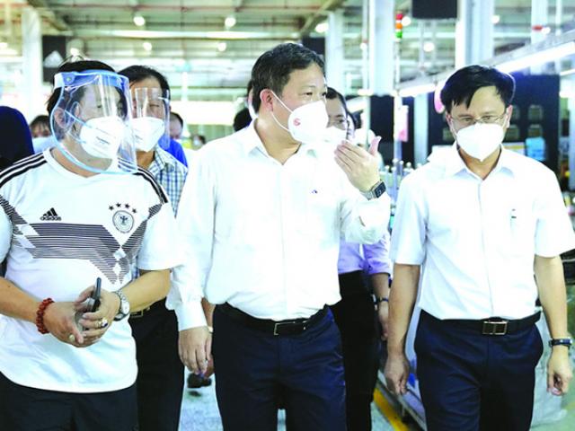 Tin tức trong ngày - TP HCM - một năm vất vả, nghĩa tình