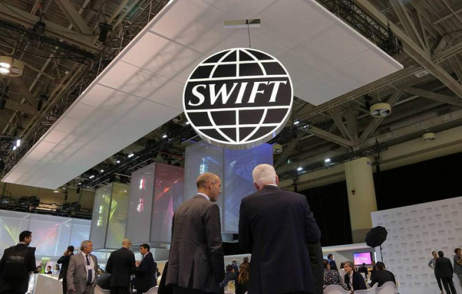 Nga bị loại khỏi hệ thống trao đổi thông tin giao dịch quốc tế SWIFT. Ảnh: REUTERS