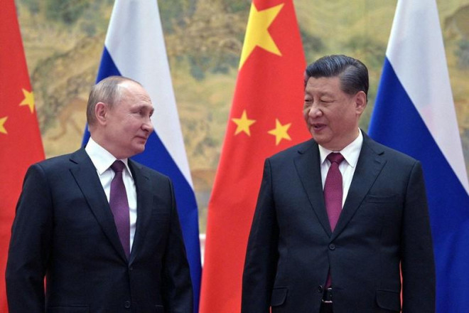 Chủ tịch Trung Quốc Tập Cận Bình (phải) và Tổng thống Nga Vladimir Putin. Ảnh: TNS