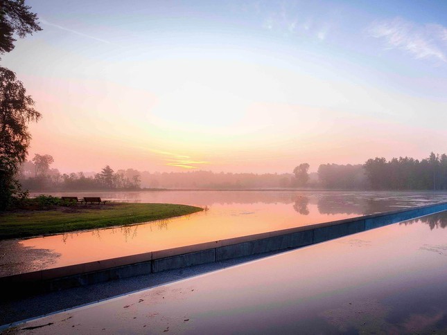 Cycling Through Water: Cycling "chill"  with a view of clouds and water on the most beautiful road in Belgium - 1