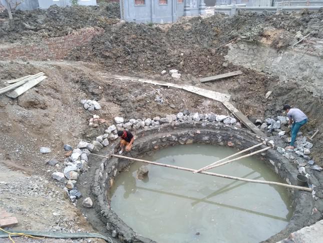 Why was the ancient well at the temple of historian Le Van Huu in Thanh Hoa demolished?  - first