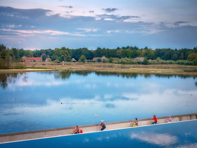 Cycling Through Water: Cycling "chill"  with a view of clouds and water on the most beautiful road in Belgium - 3